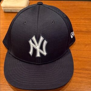New Era Navy Blue Cap with White Logo